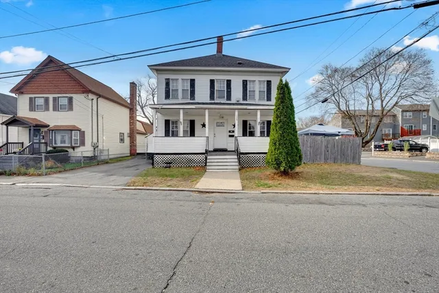 a view of a street with cars