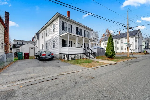 a view of house with swimming pool