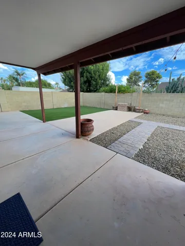 a view of a garden with an outdoor space