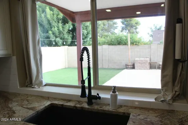 a view of a floor to ceiling window and a floor to ceiling window