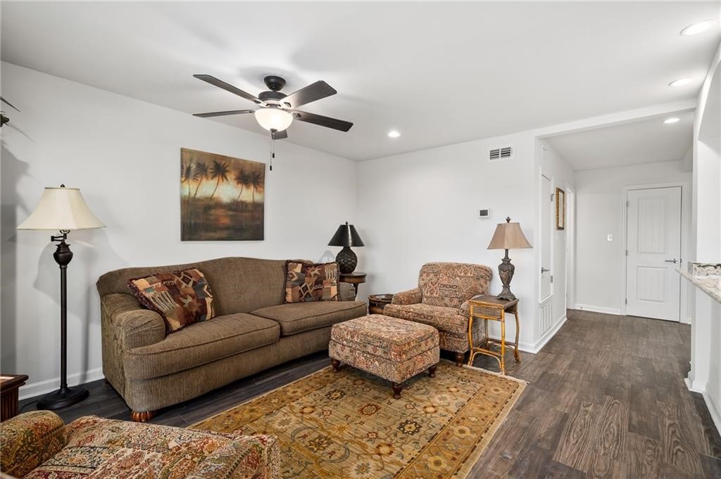 620 Fulton Beach Road, Unit 203 Rockport, TX 78382 - Photo 17 of 37 a living room with furniture and a ceiling fan