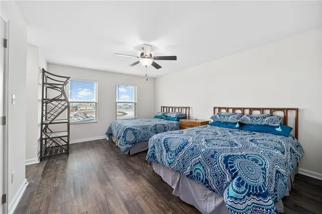 a bedroom with double bed and a window