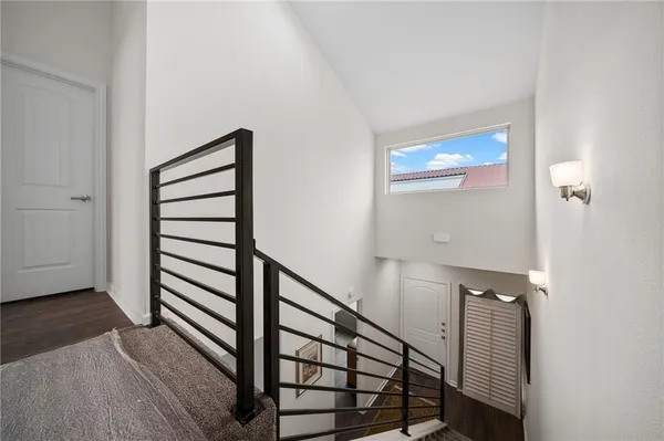 a view of entryway with wooden floor
