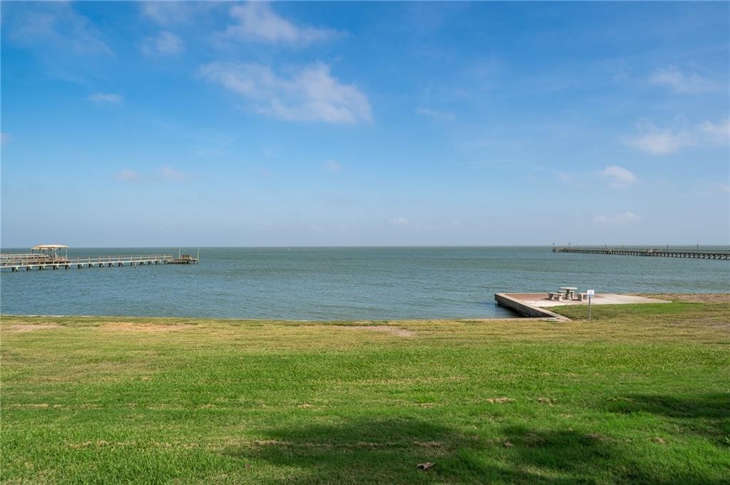 620 Fulton Beach Road, Unit 203 Rockport, TX 78382 - Photo 31 of 37 a view of an ocean from a balcony