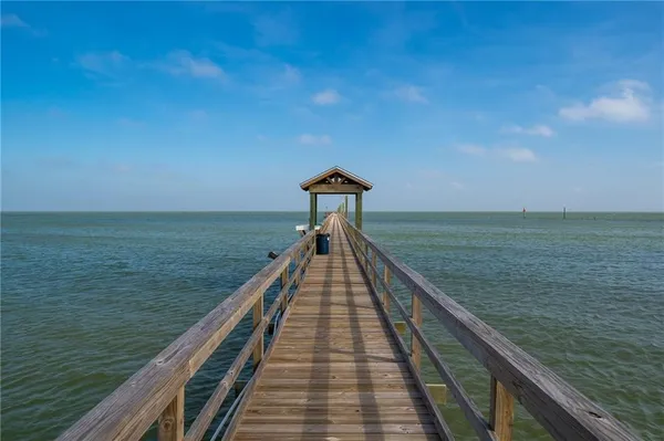 a view of a lake with a large window