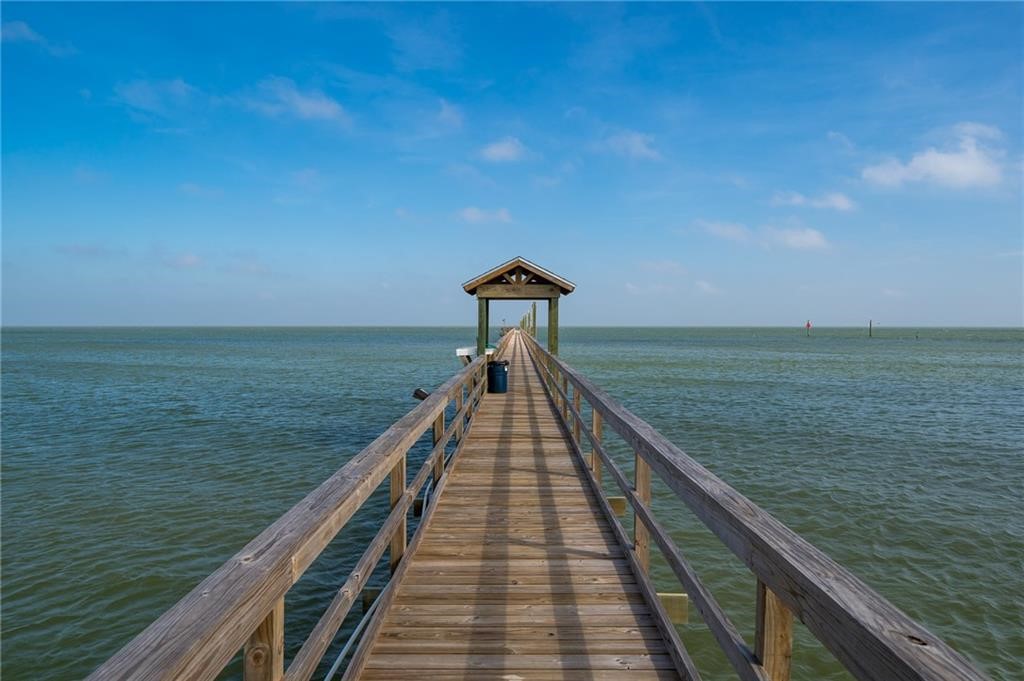 620 Fulton Beach Road, Unit 203 Rockport, TX 78382 - Photo 34 of 37 a view of a lake with a large window