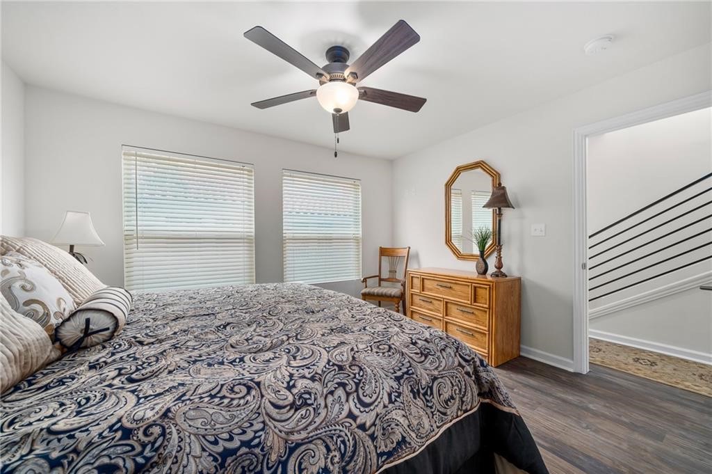620 Fulton Beach Road, Unit 203 Rockport, TX 78382 - Photo 5 of 37 a bedroom with a large bed and a large window