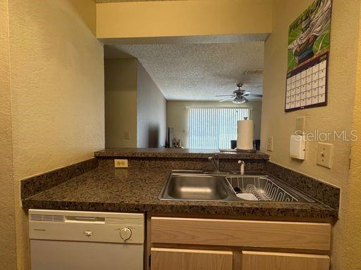 3705 Southwest 27th Street, Unit 713 Gainesville, FL 32608 - Photo 4 of 13 a close view of sink and tap