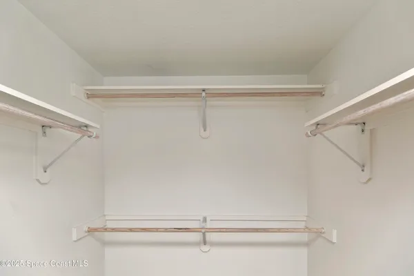 a utility room with sink dryer and washer