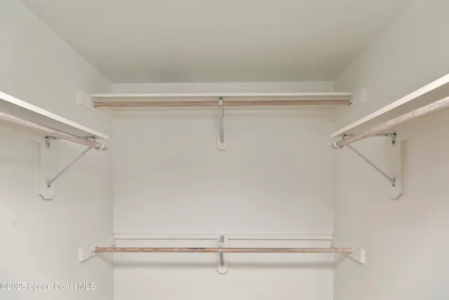 a utility room with sink dryer and washer