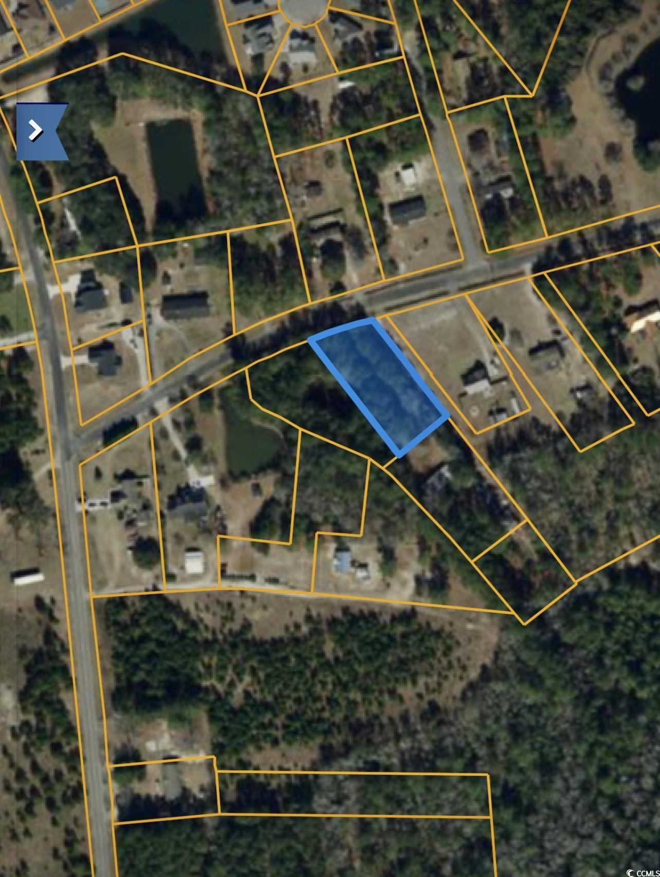Aerial overview of property's location with property parcel outlined