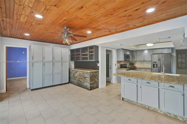 a view of livingroom with hardwood floor and dining room