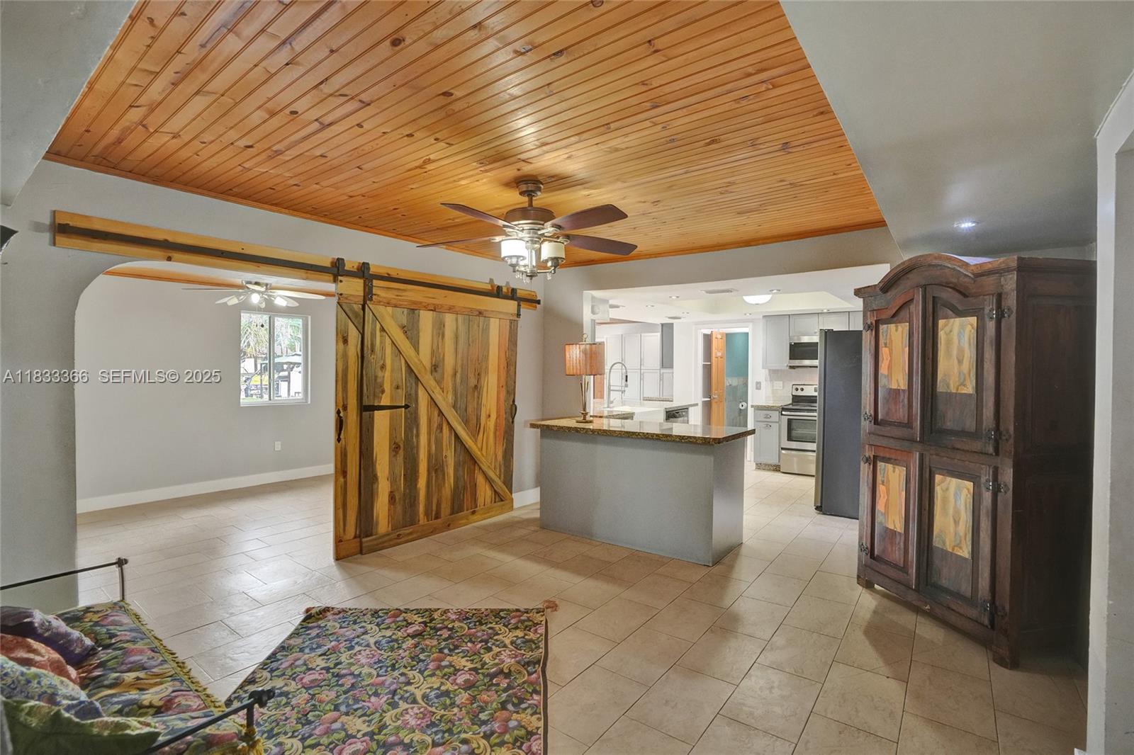 5840 Southwest 19th Street Plantation, FL 33317 - Photo 17 of 66 a view of entryway with furniture and wooden floor