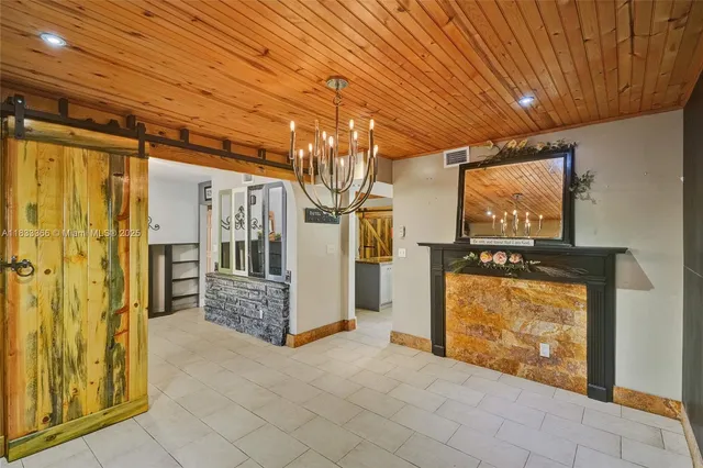 a bathroom with a bathtub sink and mirror