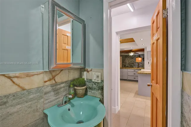 a view of house with backyard outdoor seating and entertaining space