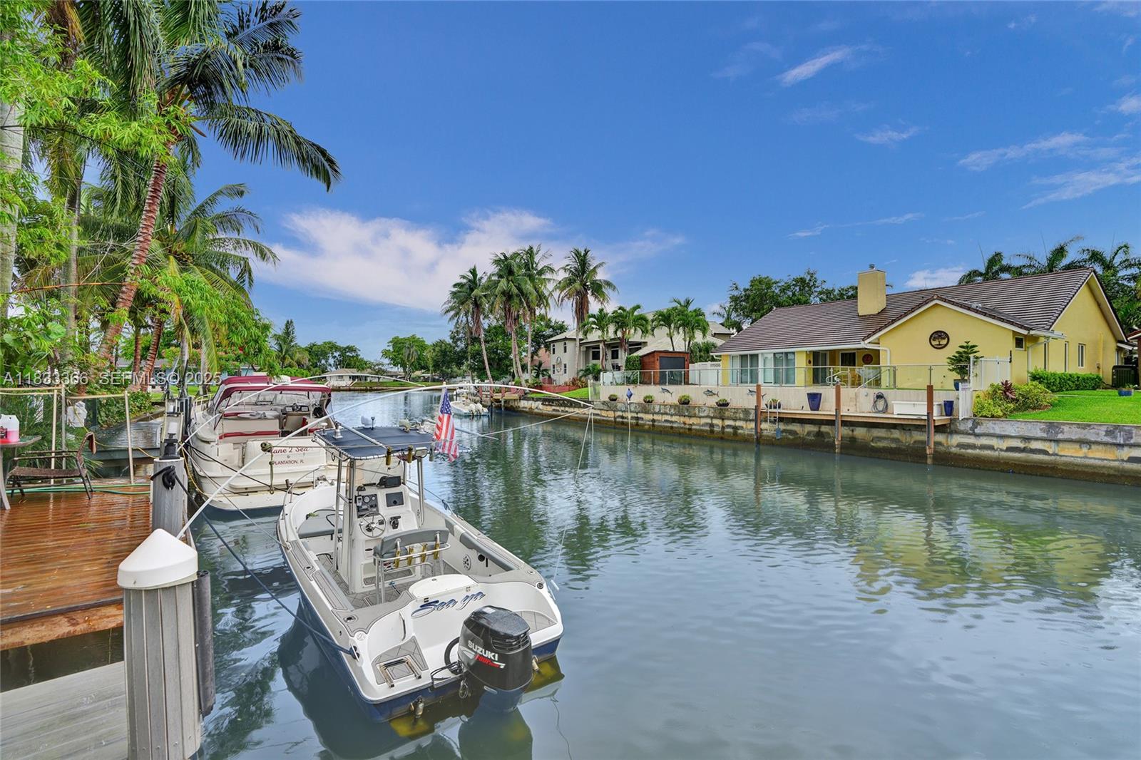 5840 Southwest 19th Street Plantation, FL 33317 - Photo 50 of 66 a view of a lake with houses