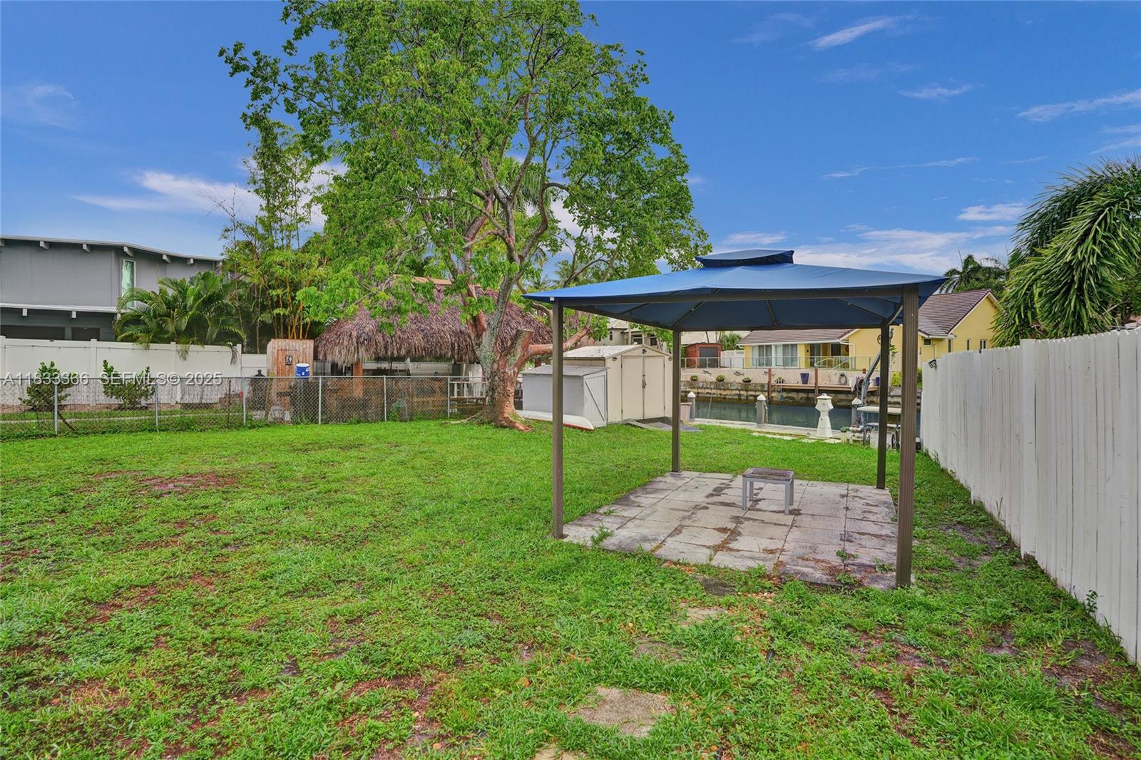 5840 Southwest 19th Street Plantation, FL 33317 - Photo 51 of 66 a view of a backyard with a garden