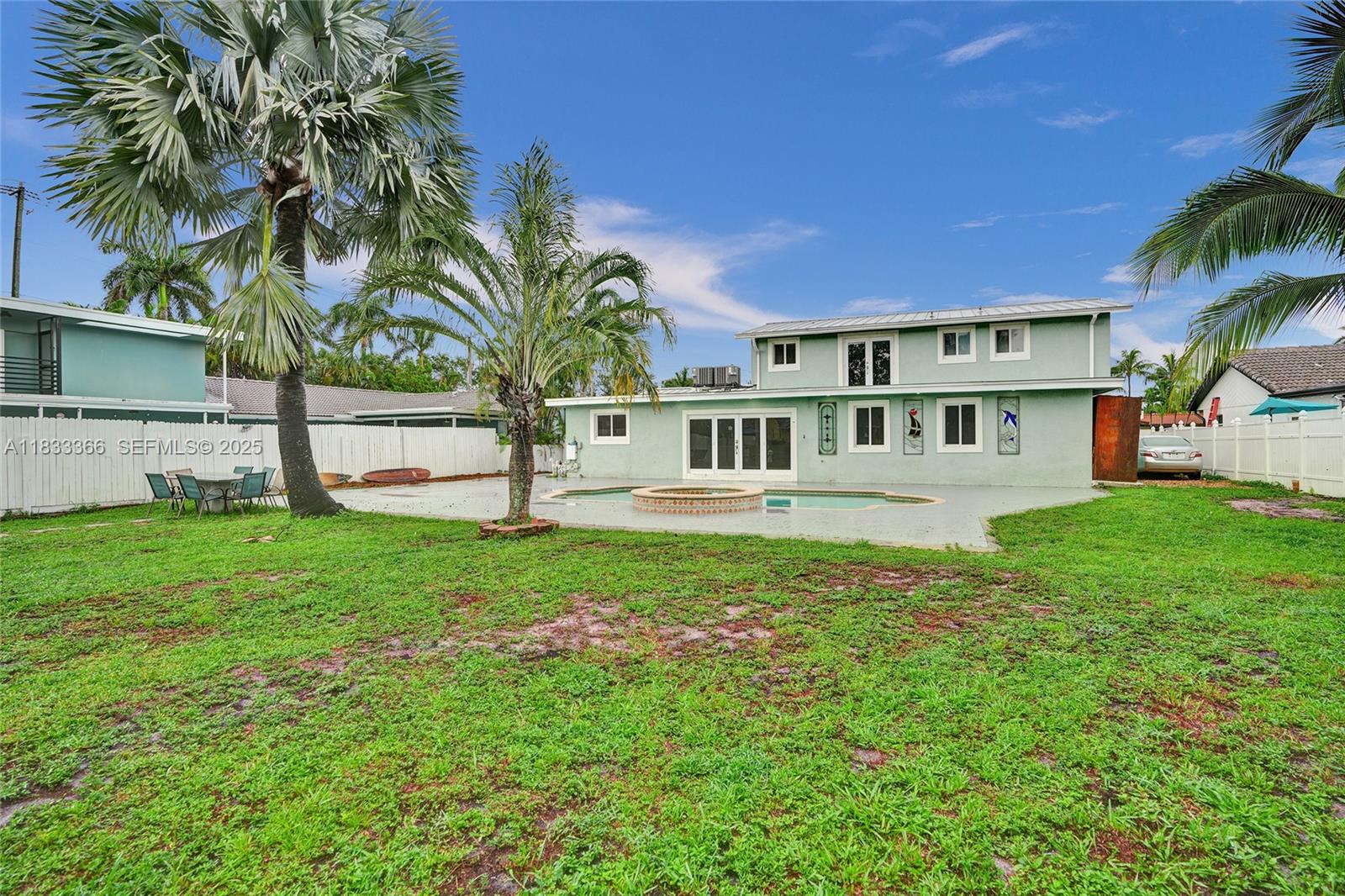 5840 Southwest 19th Street Plantation, FL 33317 - Photo 54 of 66 a view of a house with a yard