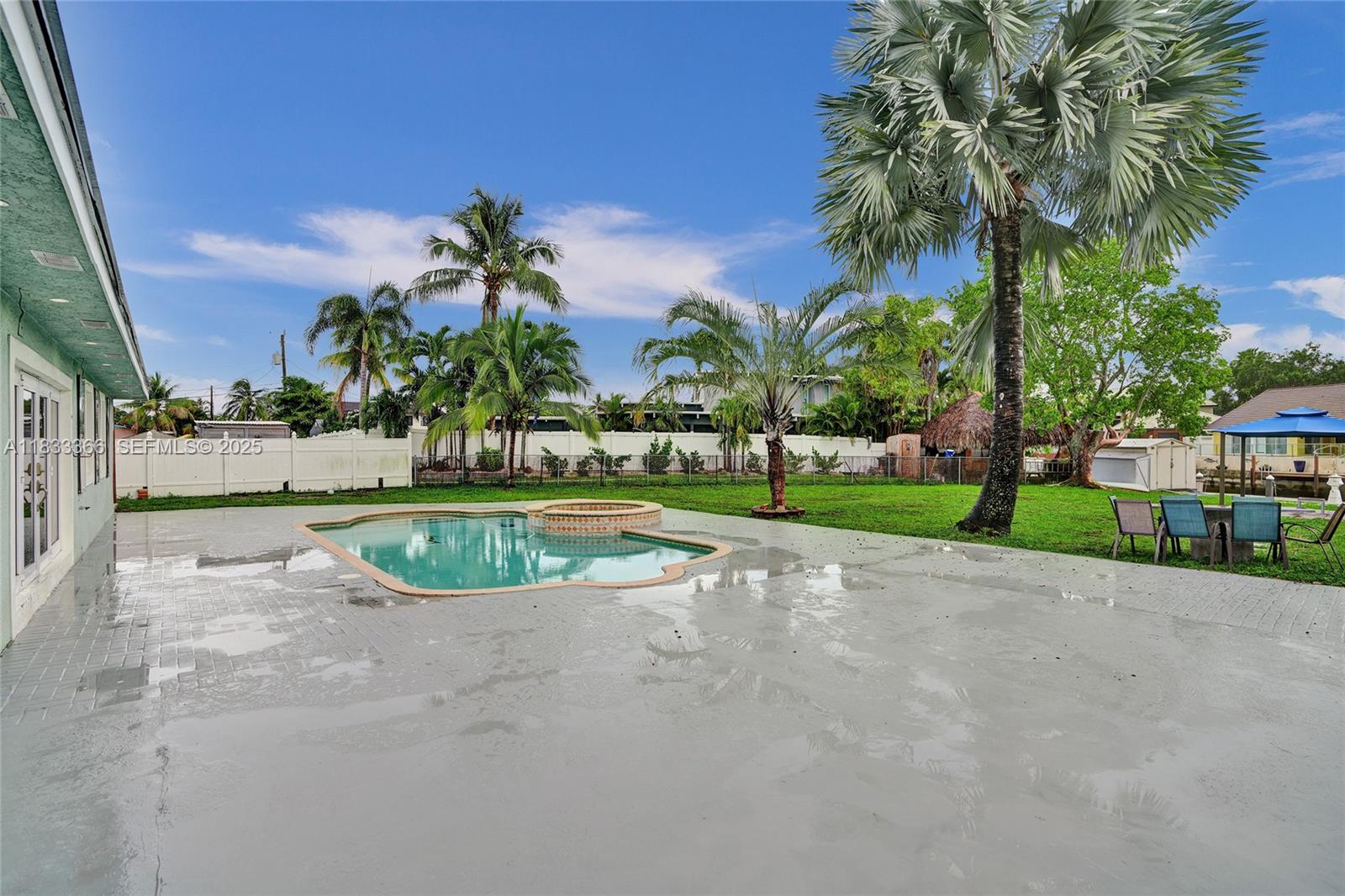 5840 Southwest 19th Street Plantation, FL 33317 - Photo 58 of 66 a view of a garden with palm trees