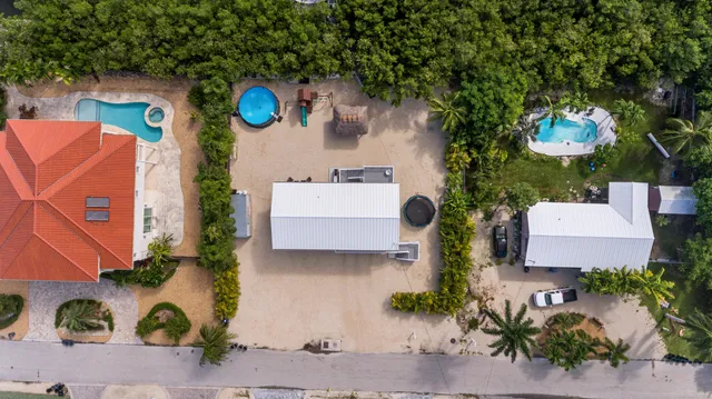 an aerial view of a house with a garden