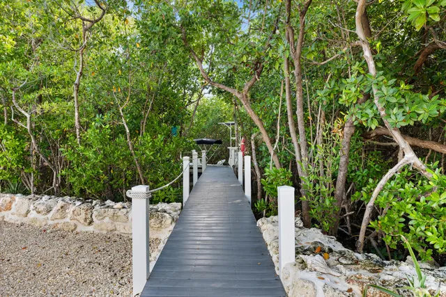 a view of a pathway with a bench