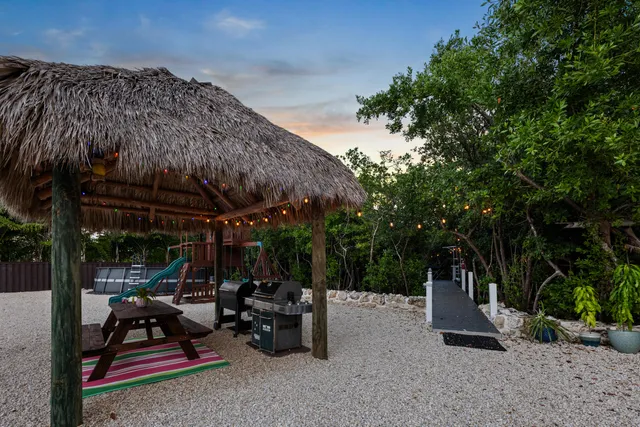 a view of balcony with furniture