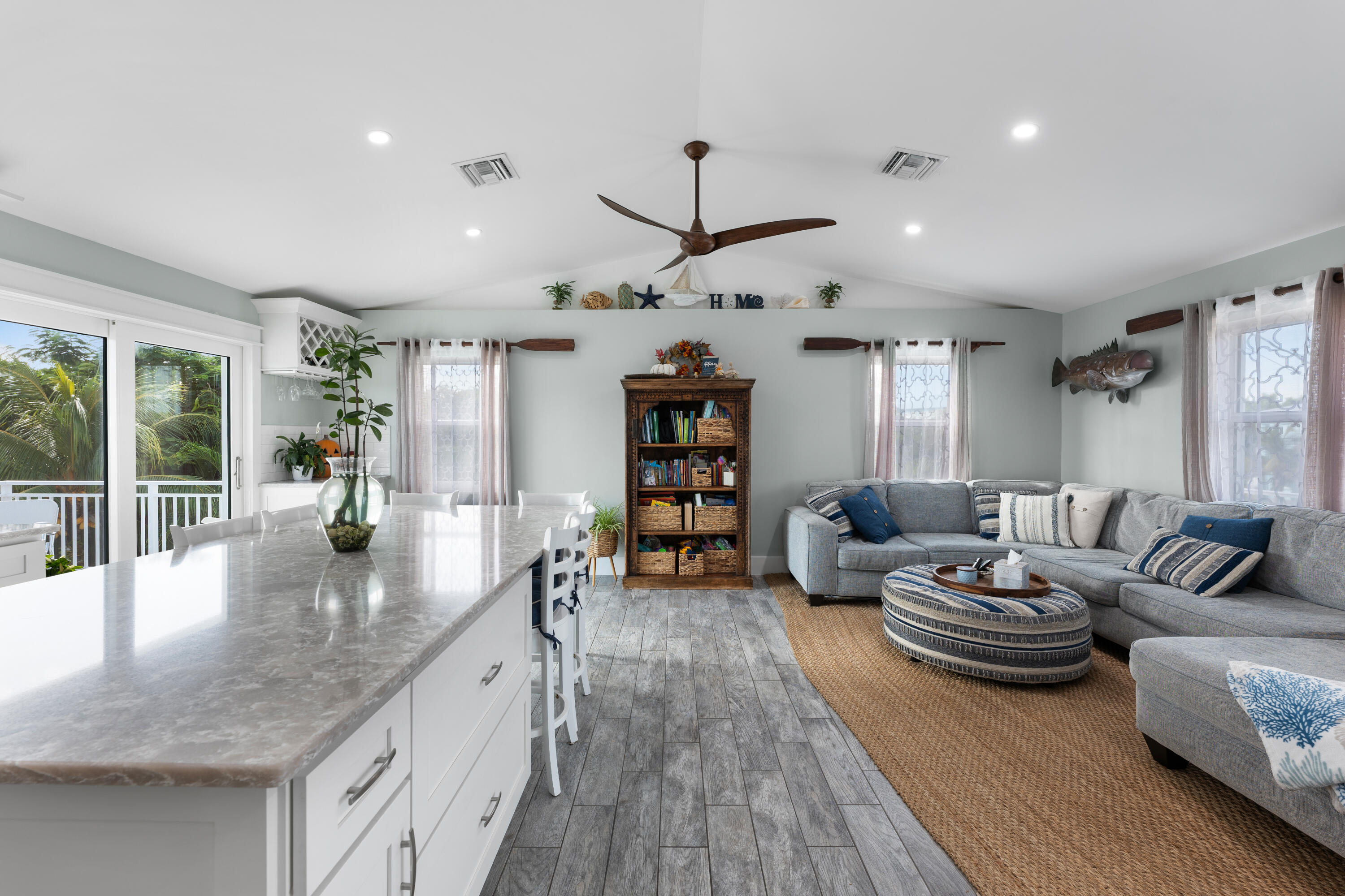 1325 Ave H Marathon, FL 33050 - Photo 10 of 46 a living room with furniture kitchen view and a large window