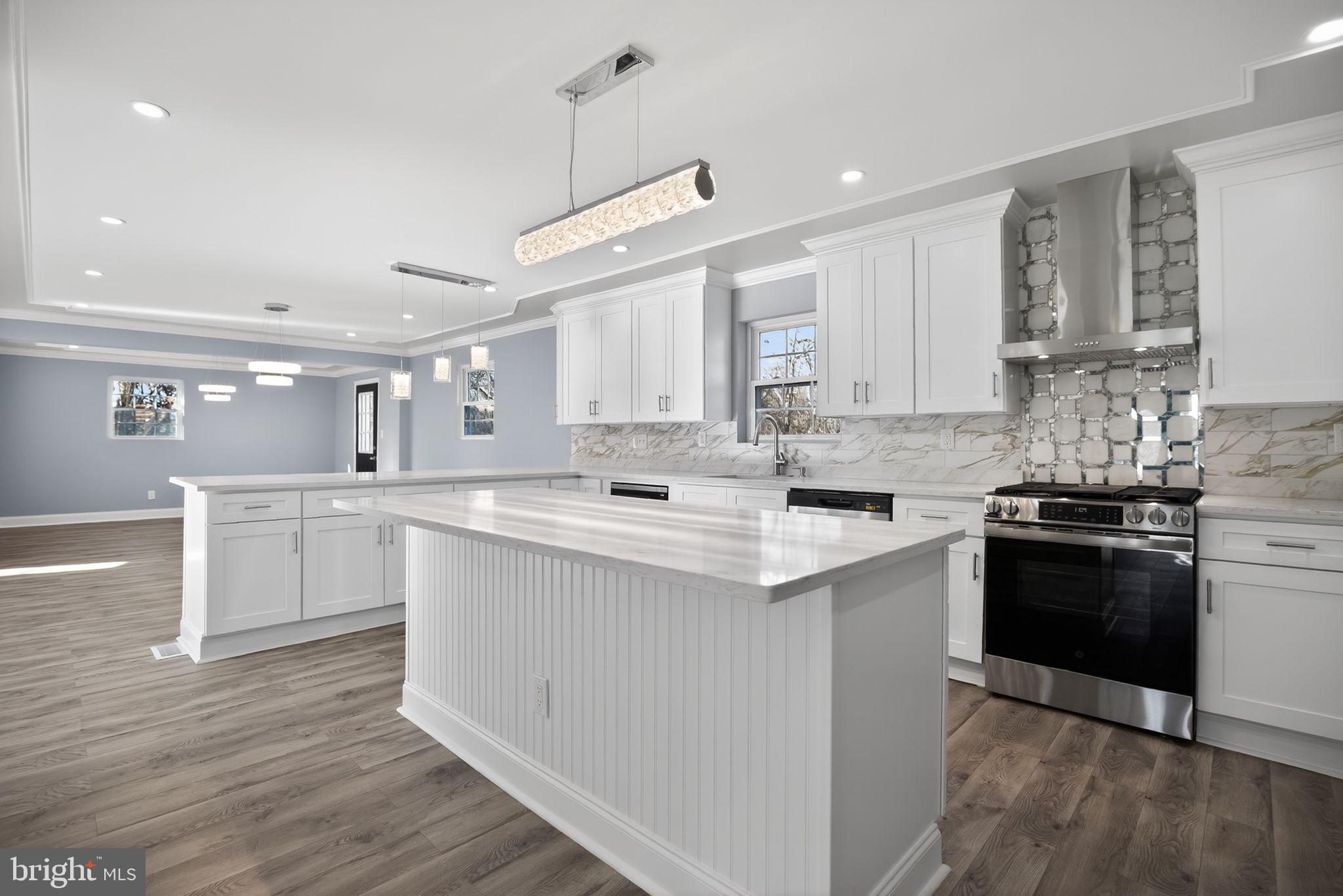 931 Woodlane Road Westampton, NJ 08060 - Photo 11 of 33 a kitchen with white cabinets and appliances
