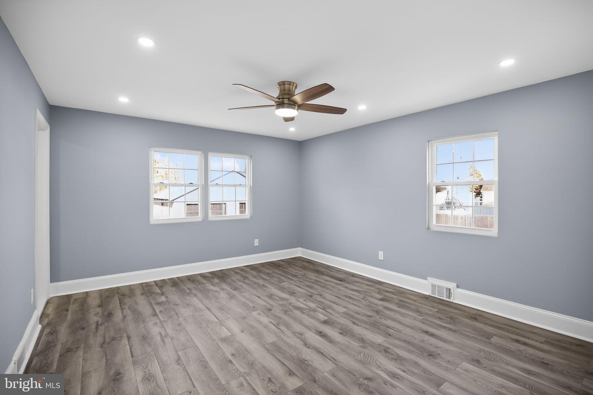 931 Woodlane Road Westampton, NJ 08060 - Photo 22 of 33 wooden floor in an empty room with a window