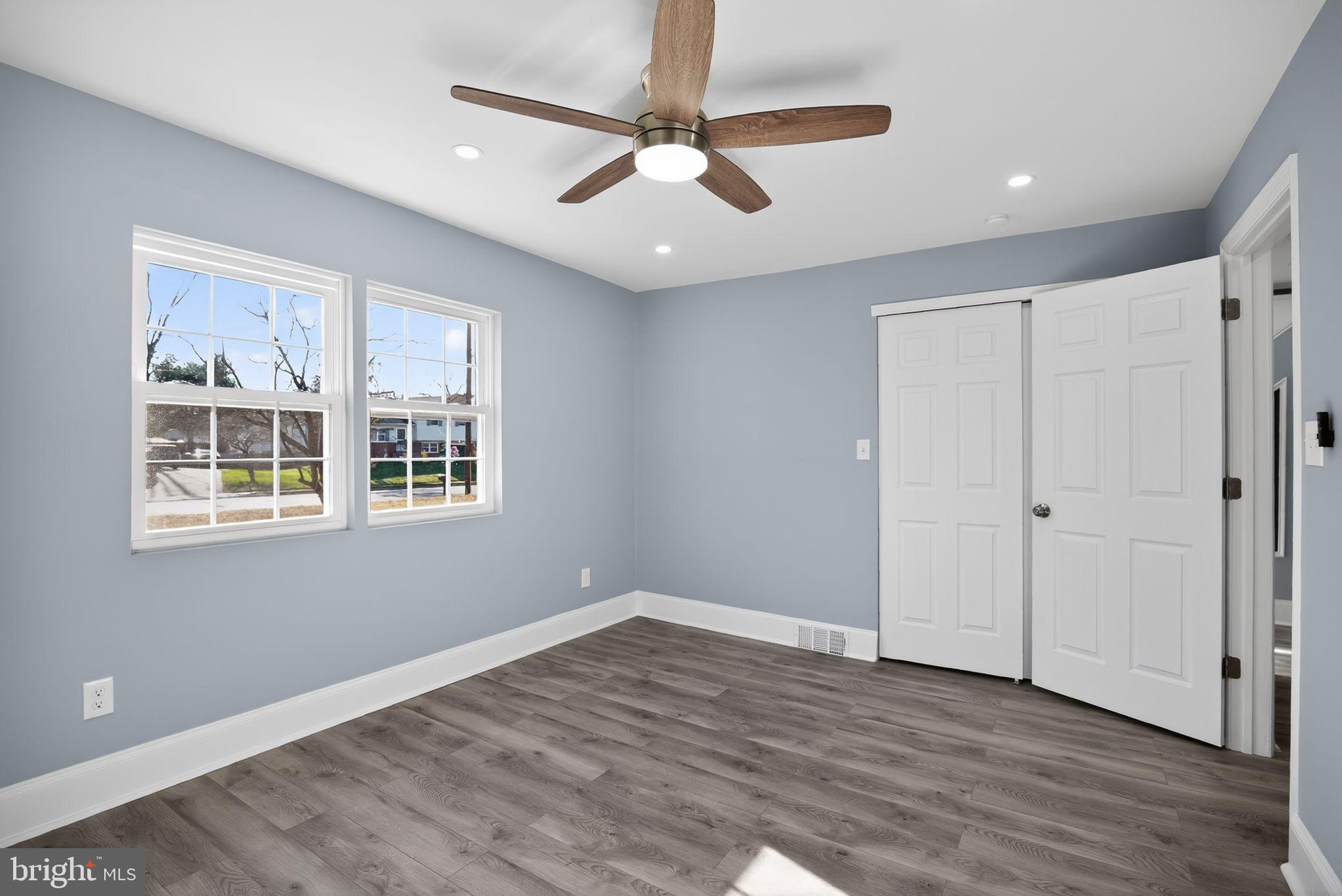 931 Woodlane Road Westampton, NJ 08060 - Photo 23 of 33 a view of an empty room with window and wooden floor
