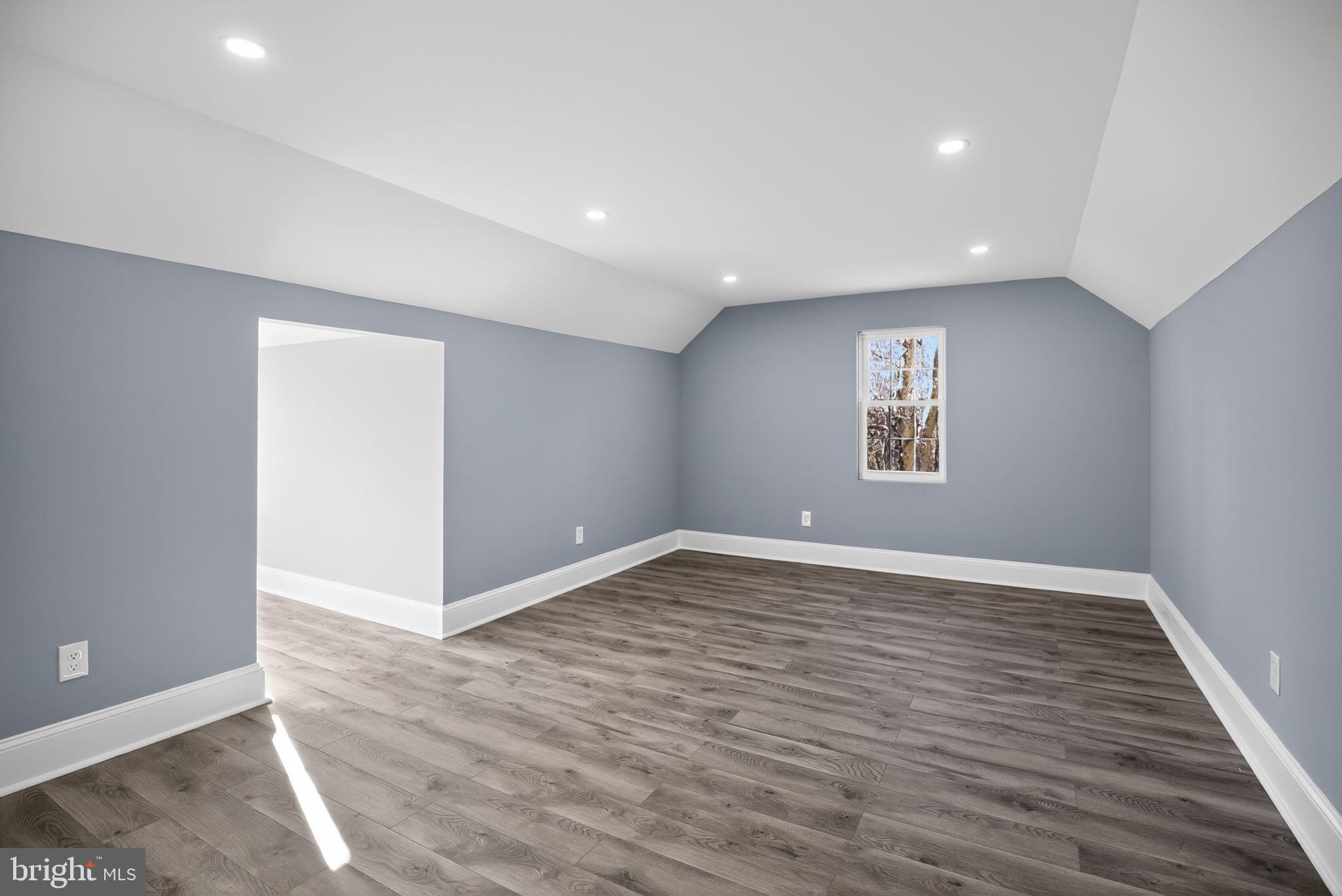 931 Woodlane Road Westampton, NJ 08060 - Photo 28 of 33 a view of an empty room with wooden floor and a window