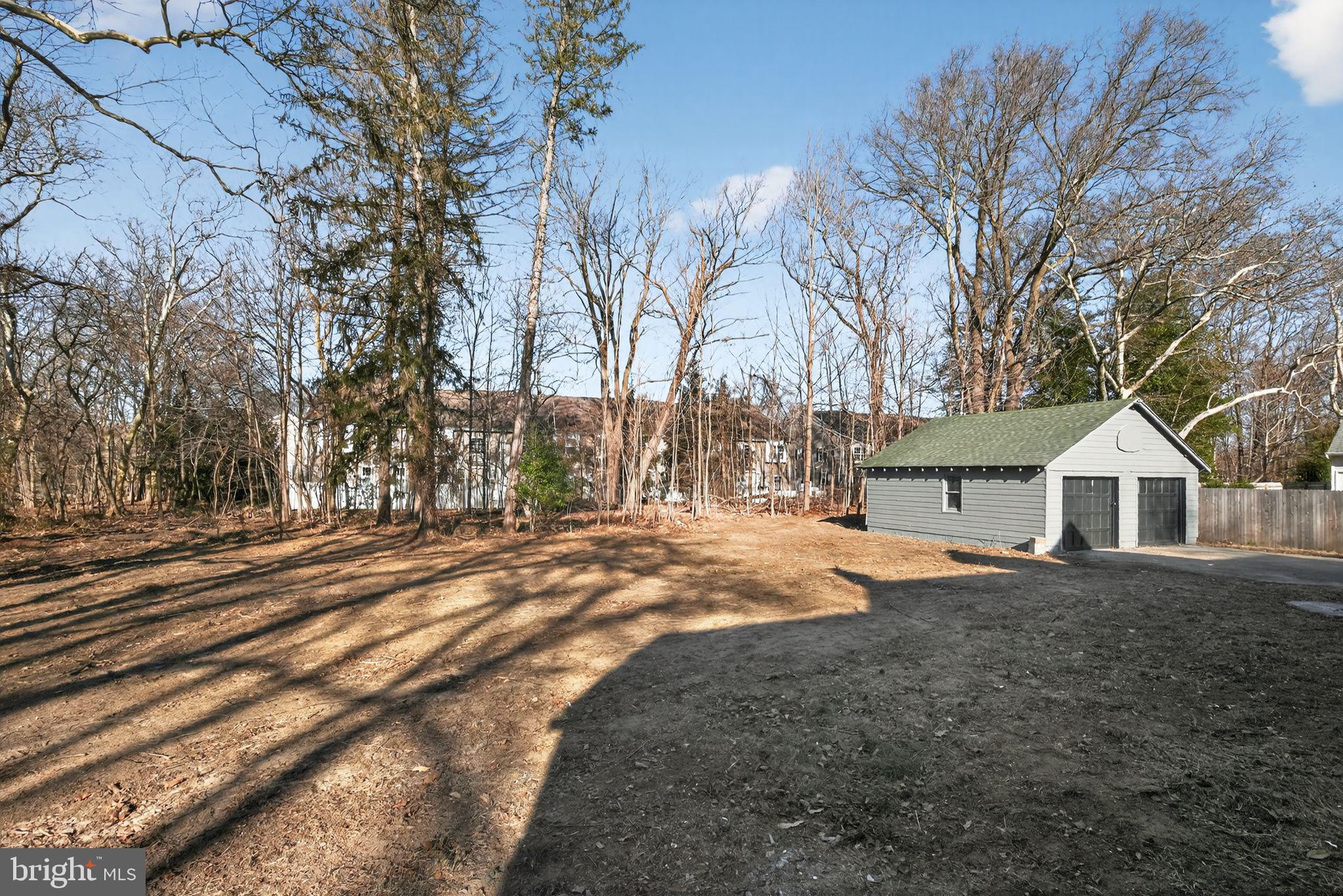 931 Woodlane Road Westampton, NJ 08060 - Photo 33 of 33 a view of a house with a yard covered in snow