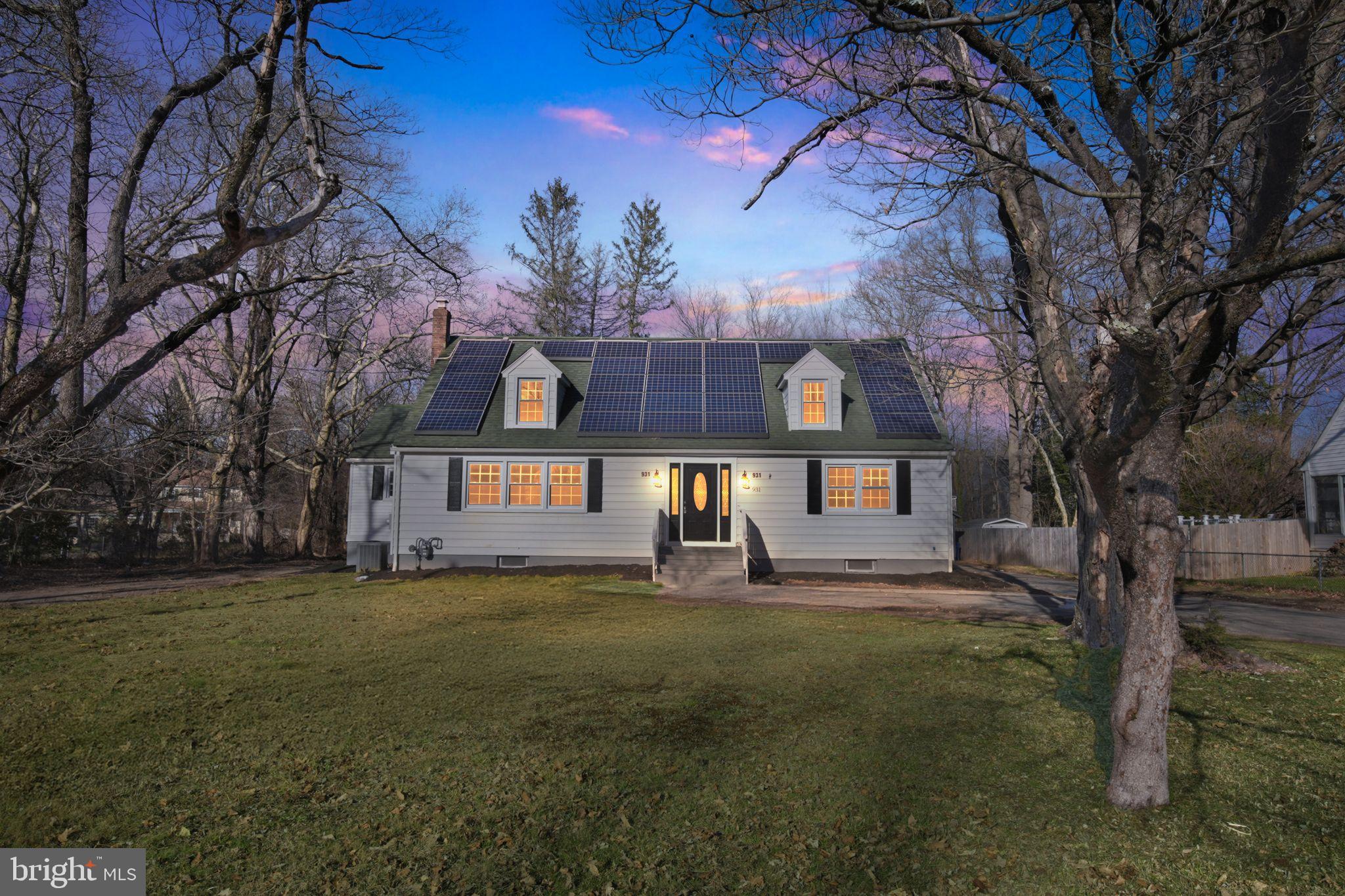 931 Woodlane Road Westampton, NJ 08060 - Photo 5 of 33 a house that has a big yard and large trees