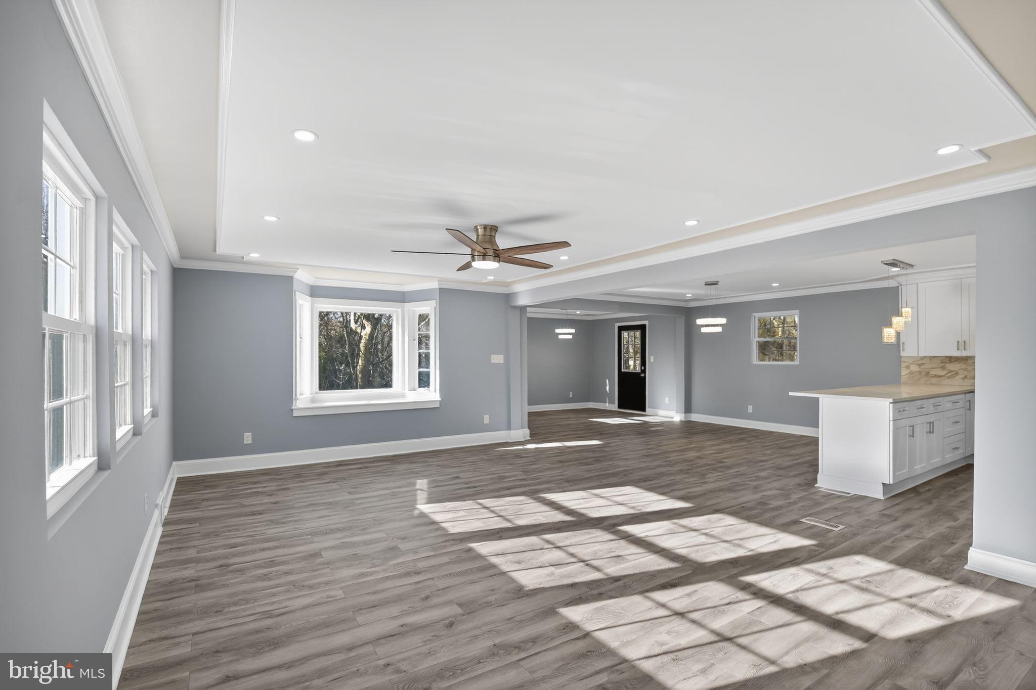 931 Woodlane Road Westampton, NJ 08060 - Photo 10 of 33 a view of a livingroom with wooden floor and workspace