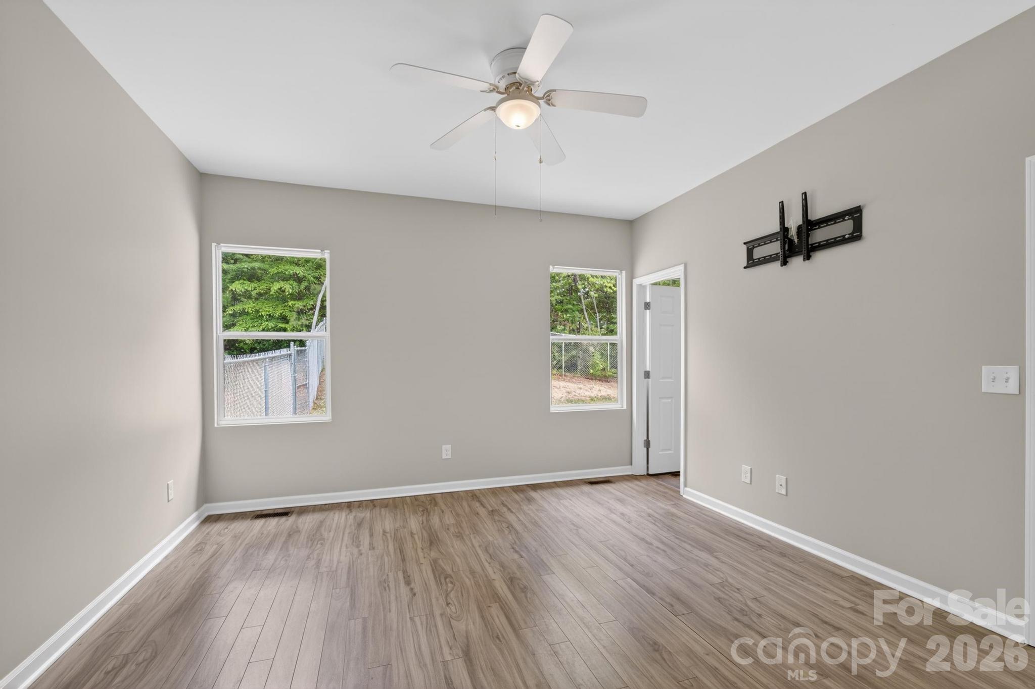 2119 South Road Morganton, NC 28655 - Photo 24 of 47 wooden floor in an empty room with a window