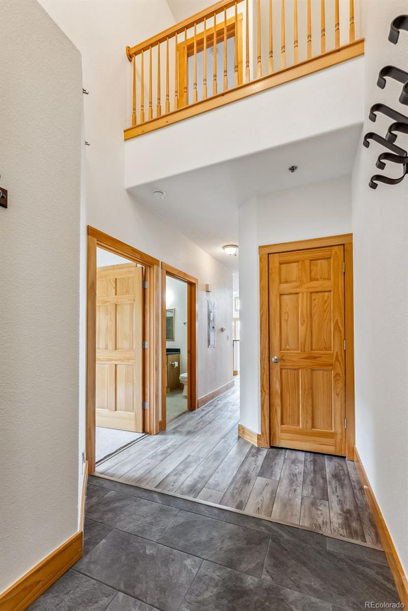 135 Main Street, Unit 214 Dillon, CO 80435 - Photo 14 of 42 wooden floor in an empty room