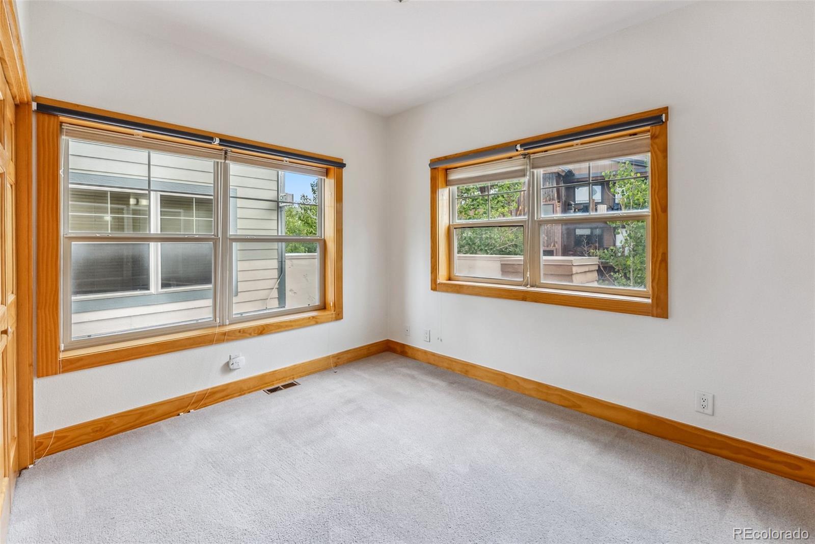 135 Main Street, Unit 214 Dillon, CO 80435 - Photo 16 of 42 a view of an empty room with a window