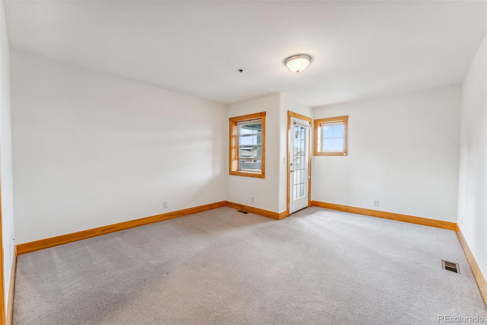 135 Main Street, Unit 214 Dillon, CO 80435 - Photo 21 of 42 a view of an empty room with a window