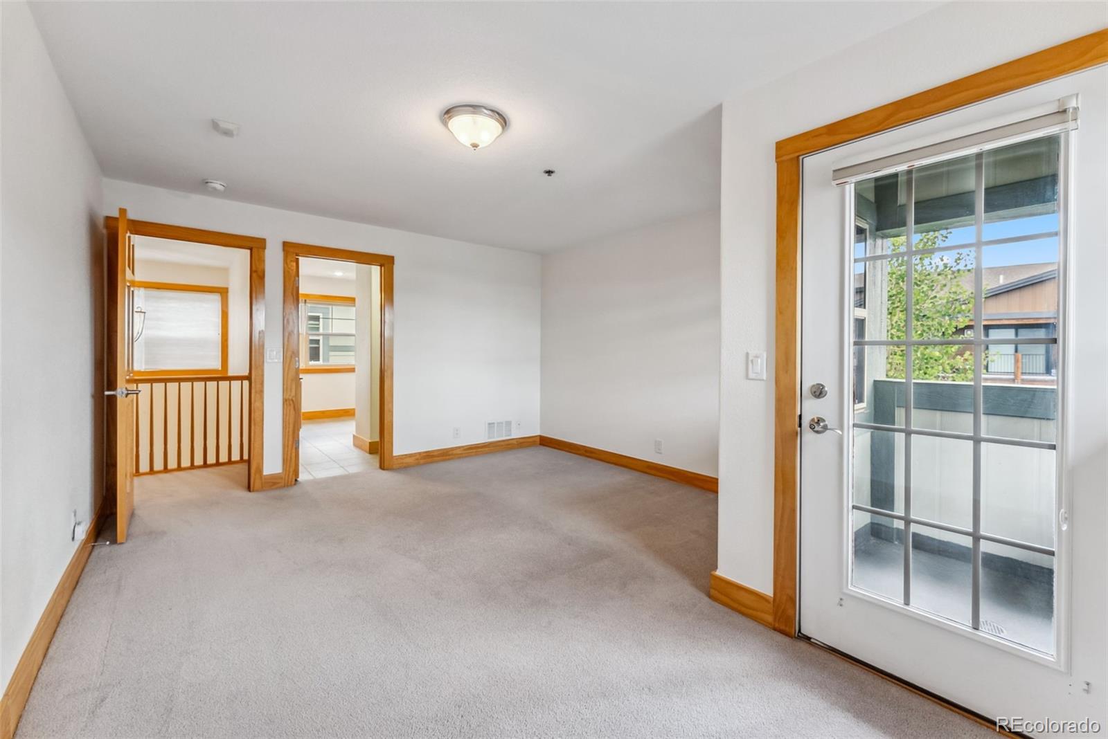 135 Main Street, Unit 214 Dillon, CO 80435 - Photo 22 of 42 an empty room with windows
