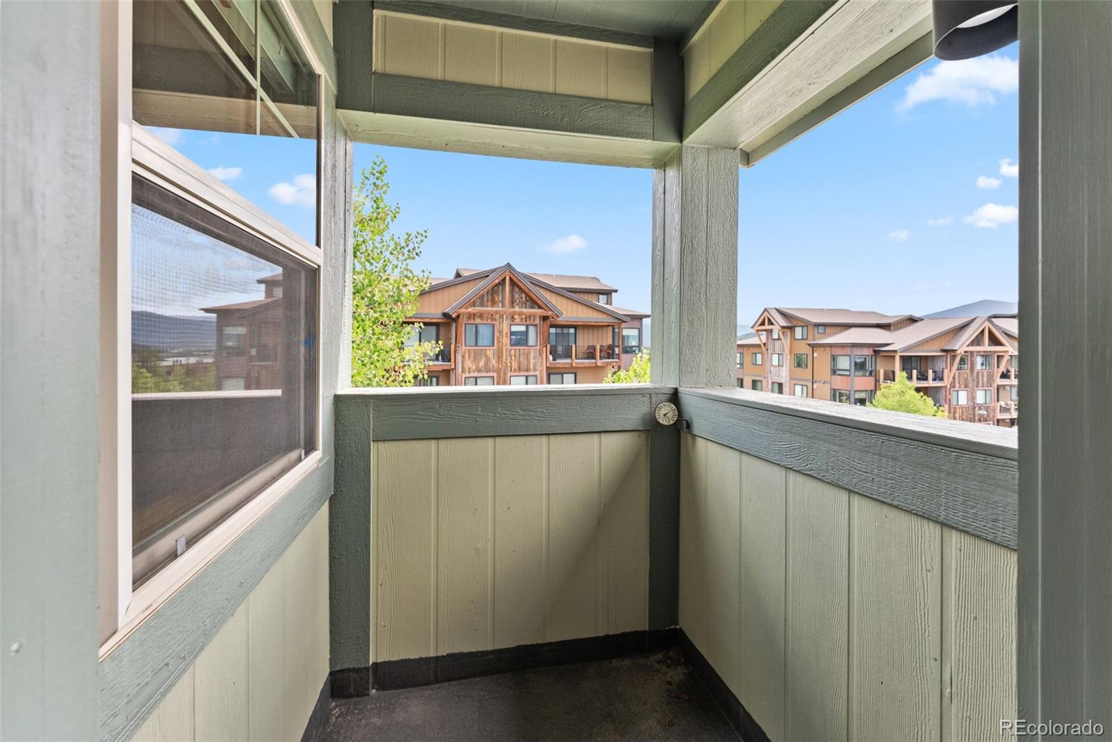 135 Main Street, Unit 214 Dillon, CO 80435 - Photo 35 of 42 a view of a glass door with a from a window