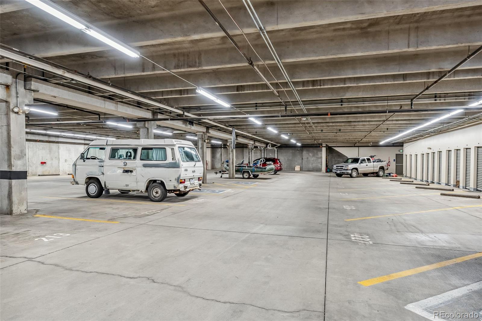 135 Main Street, Unit 214 Dillon, CO 80435 - Photo 41 of 42 a view of parking garage with cars