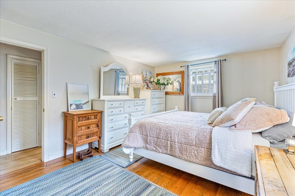 8 Stonewood Drive Canton, MA 02021 - Photo 14 of 29 a bedroom with a bed and a dresser