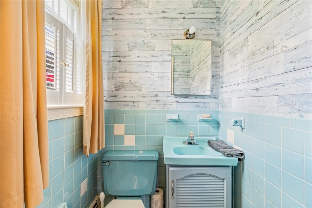 8 Stonewood Drive Canton, MA 02021 - Photo 15 of 29 a bathroom with a sink and mirror