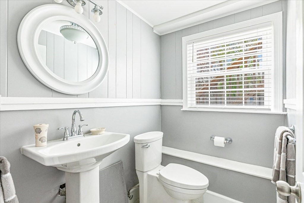 8 Stonewood Drive Canton, MA 02021 - Photo 19 of 29 a bathroom with a sink a toilet and a mirror