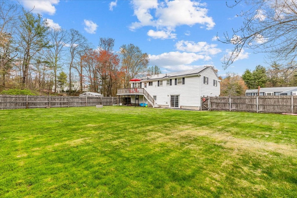 8 Stonewood Drive Canton, MA 02021 - Photo 23 of 29 a view of a house with a big yard