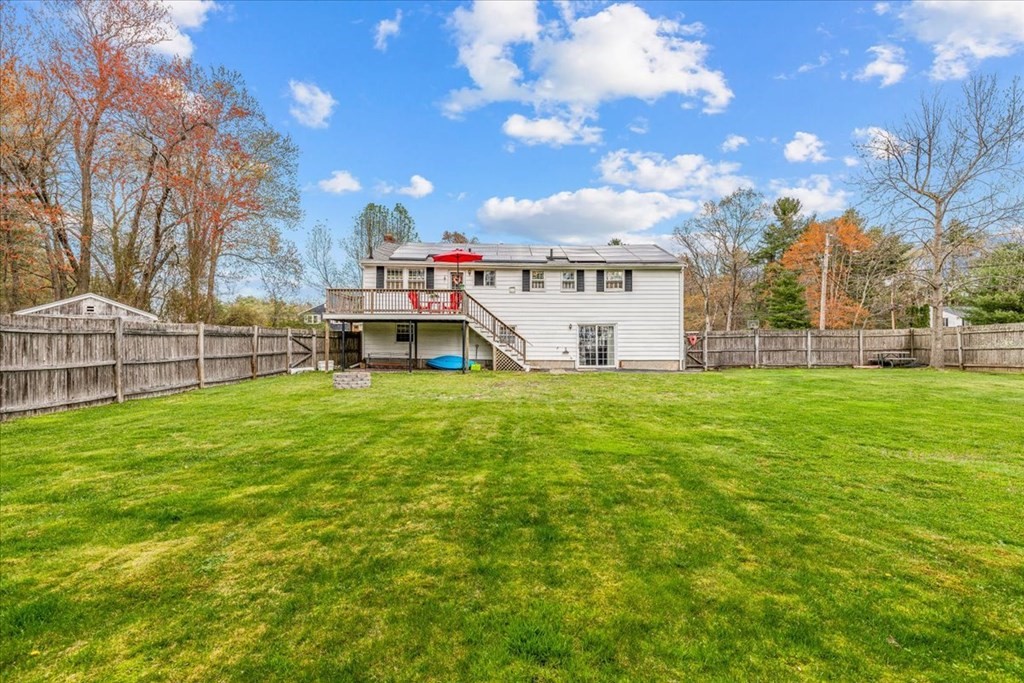 8 Stonewood Drive Canton, MA 02021 - Photo 24 of 29 a view of a house with a big yard and large tree