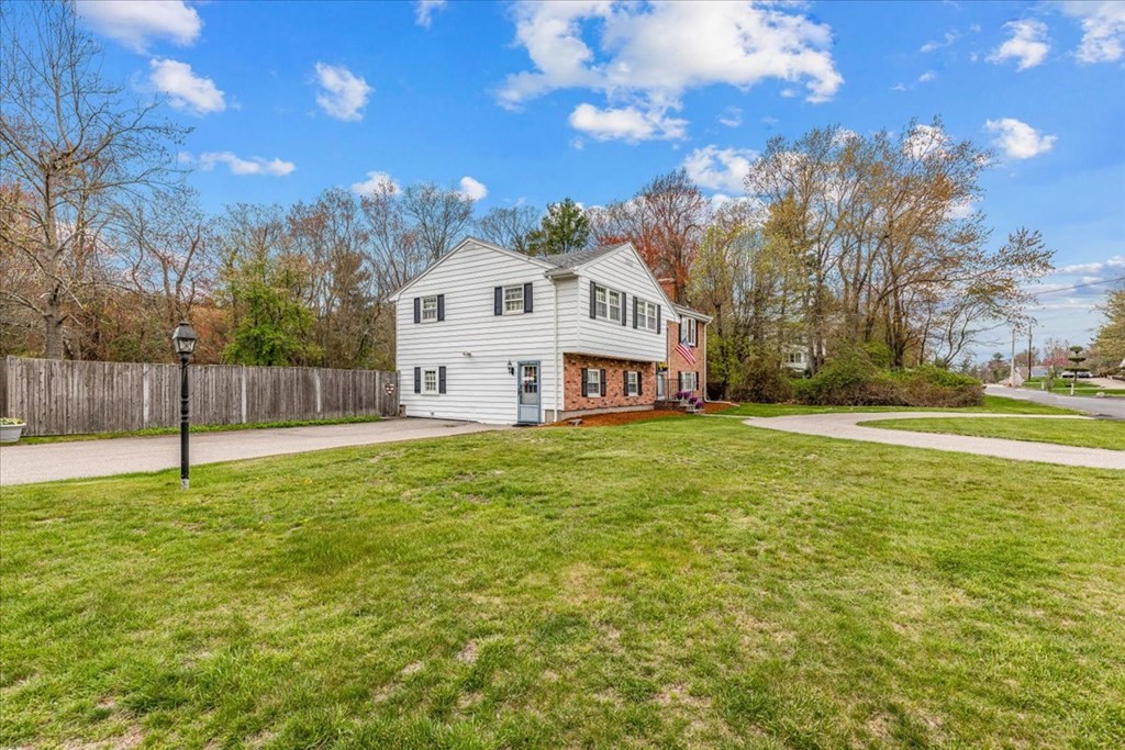 8 Stonewood Drive Canton, MA 02021 - Photo 5 of 29 a view of a house with a yard