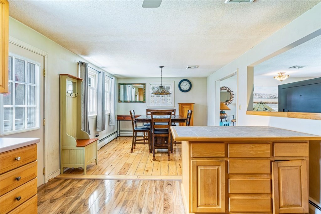 8 Stonewood Drive Canton, MA 02021 - Photo 9 of 29 a living room with furniture and wooden floor