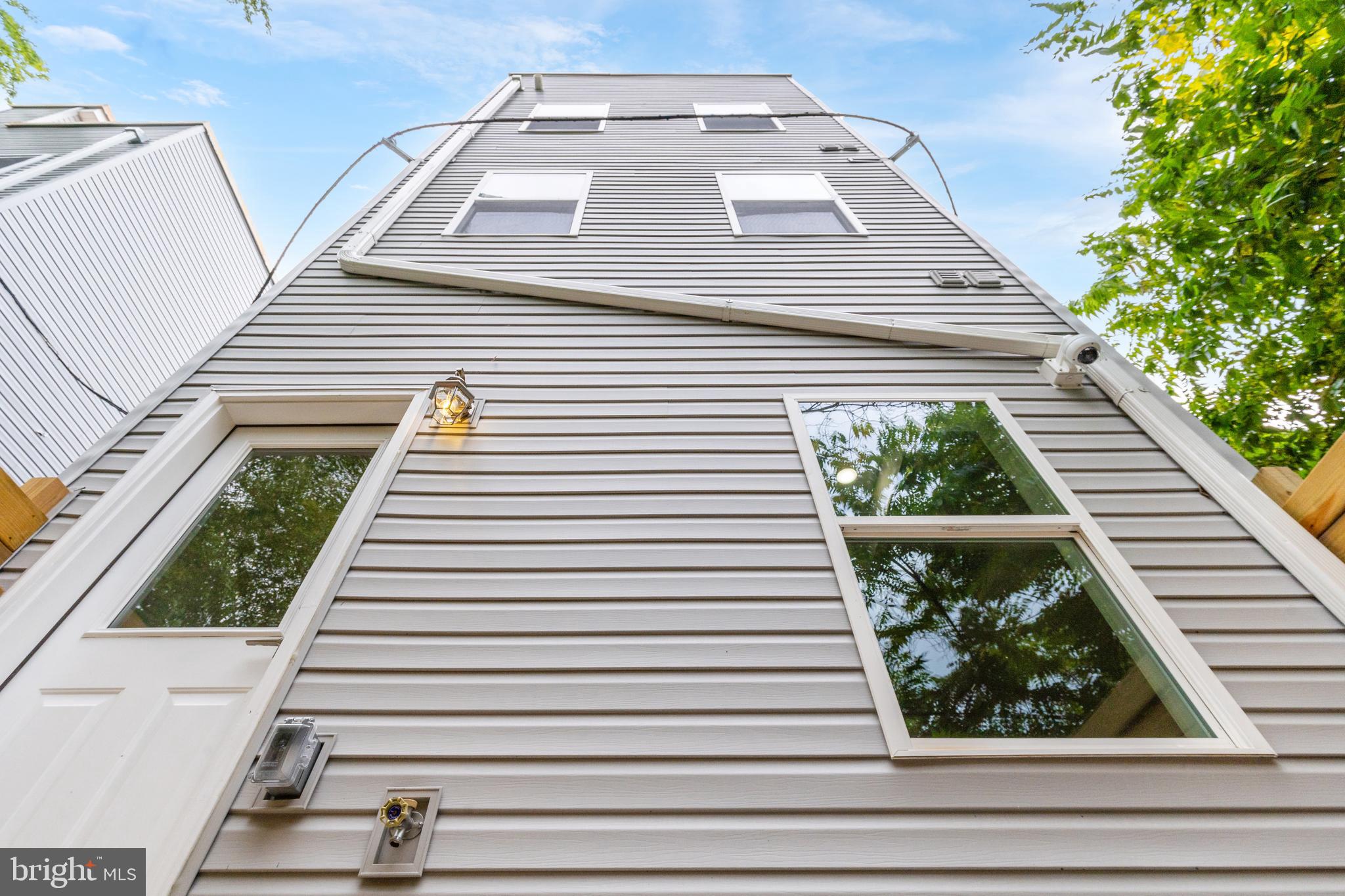 103 East Duval Street, Unit 1 Philadelphia, PA 19144 - Photo 18 of 32 a view of a back yard of the house