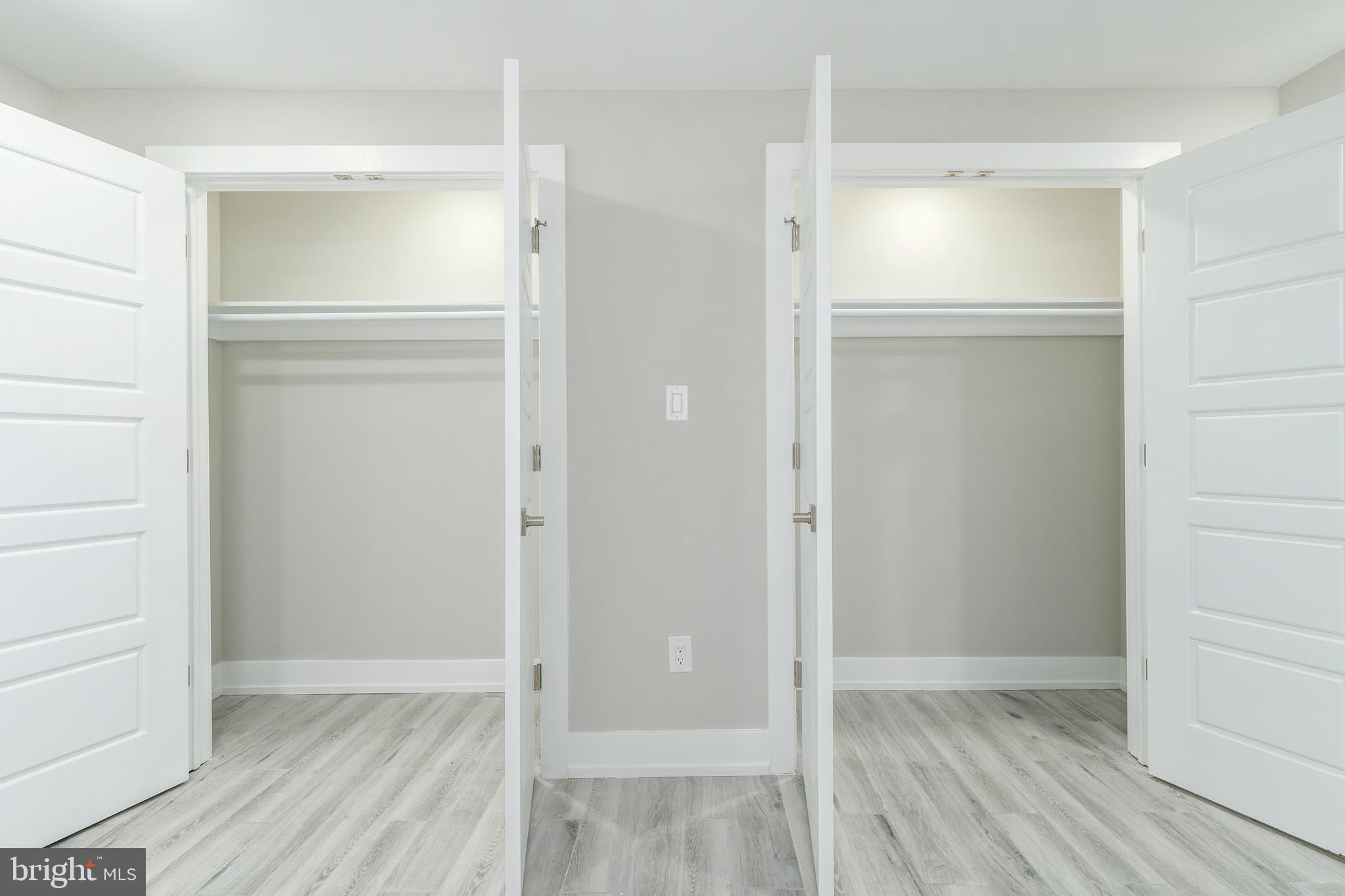 103 East Duval Street, Unit 1 Philadelphia, PA 19144 - Photo 25 of 32 a view of an empty walk in closet with wooden floor